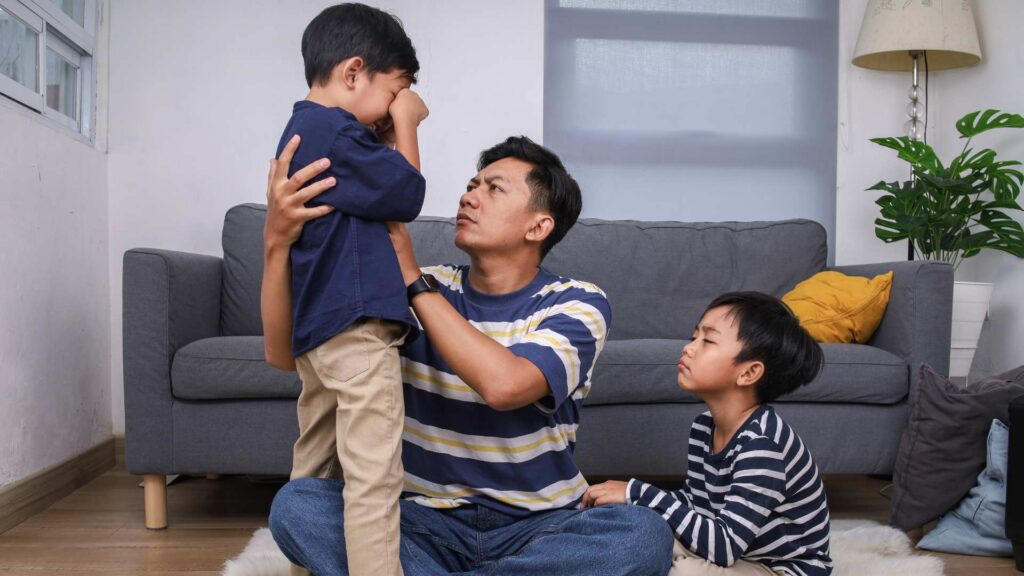 Parent comforting a child during an emotional moment as they practice a soothing skill